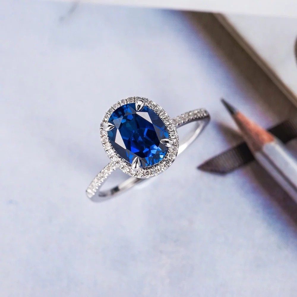 1.50 Ct Oval Cut Blue Sapphire 925 Sterling Silver Halo Engagement Ring