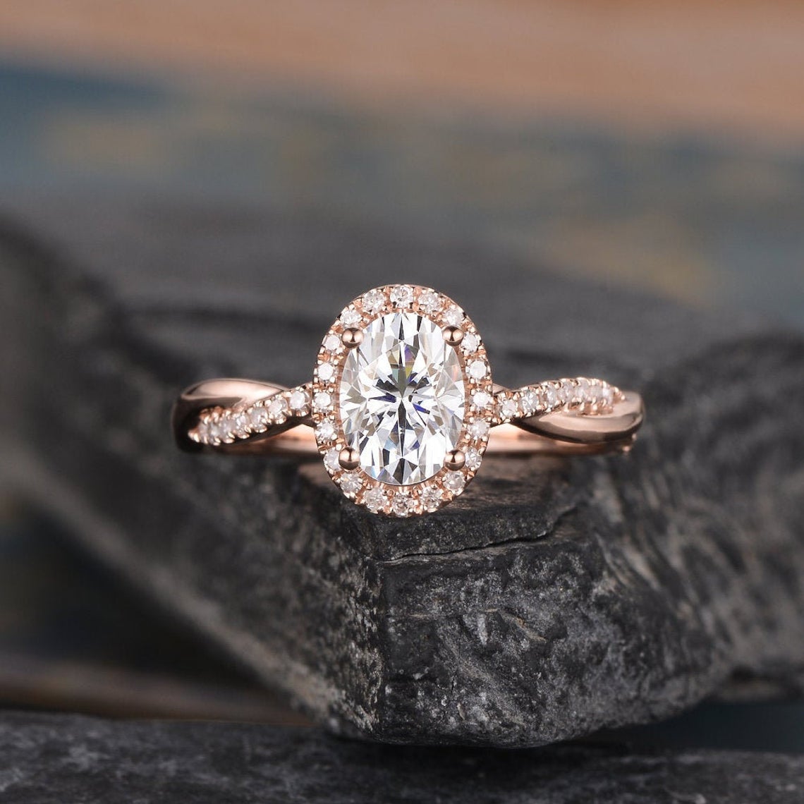 rose gold twisted infinity halo engagement ring