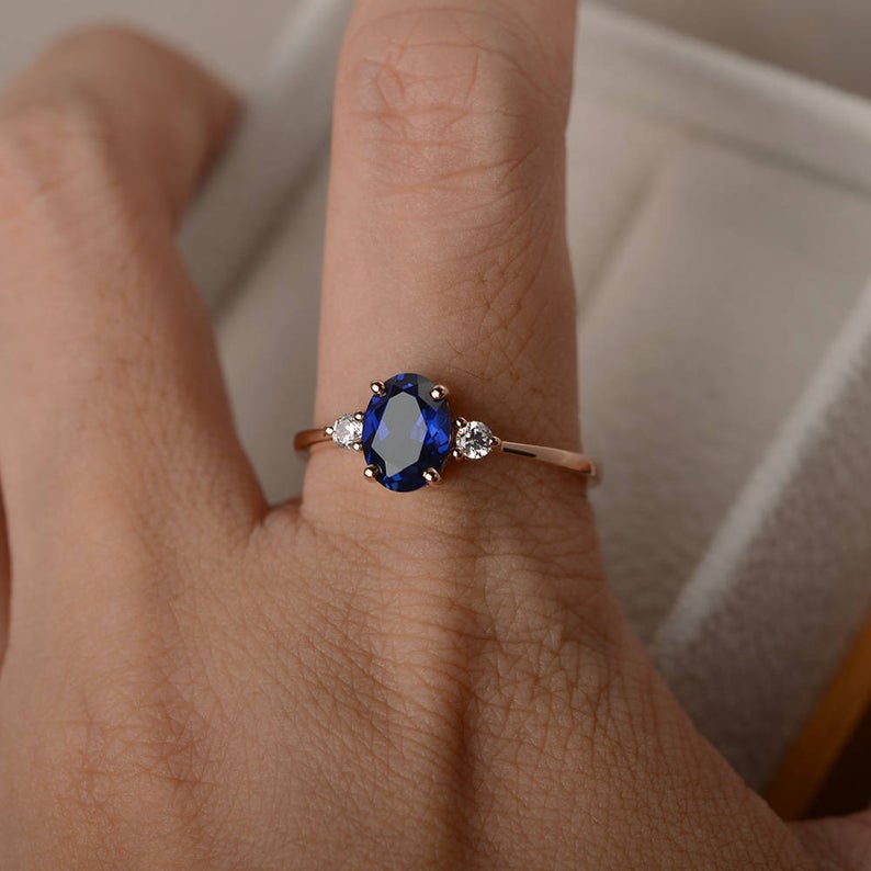 1.50 Ct Oval Cut Blue Sapphire & Round CZ Three-Stone Promise Ring In 925 Sterling Silver - atjewels.in