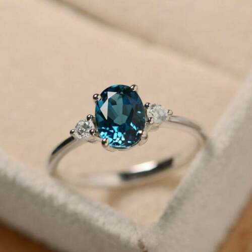 1.5 CT Oval Cut Blue Topaz & Diamond Trilogy Engagement Ring 14K White Gold Over On 925 Sterling Silver