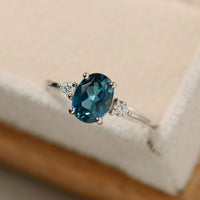 1.5 CT Oval Cut Blue Topaz & Diamond Trilogy Engagement Ring 14K White Gold Over On 925 Sterling Silver