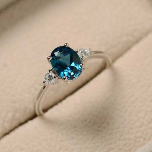 1.5 CT Oval Cut Blue Topaz & Diamond Trilogy Engagement Ring 14K White Gold Over On 925 Sterling Silver