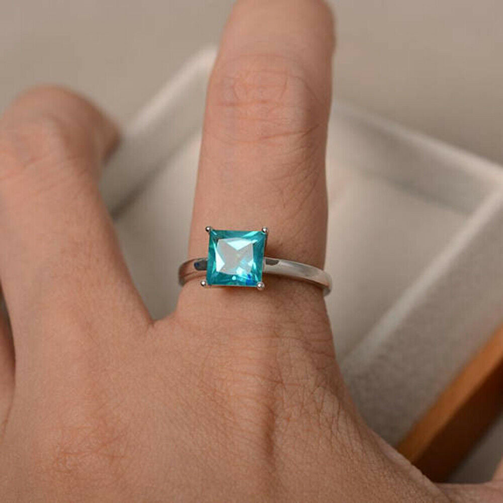 Emerald cut London blue topaz and diamond engagement ring | Emerald engagement  ring cut, Engagement rings sapphire, Diamond engagement rings