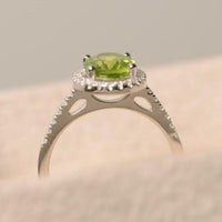 2.25 Ct Oval Cut Green Peridot Diamond 14K White Gold Over 925 Sterling Silver Halo Engagement Ring