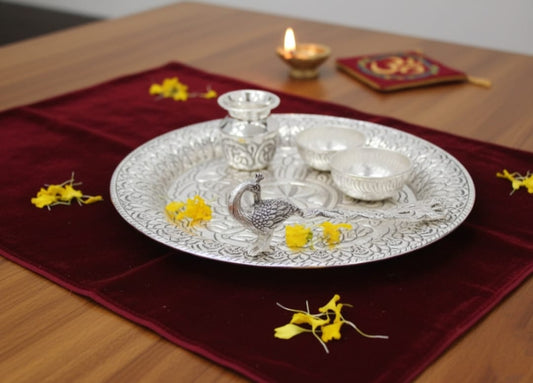 Silver pooja thali with peacock