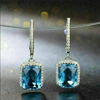 4.00 CT Emerald Cut Blue Topaz Halo Engagement Dangle Earrings In 925 Sterling Silver