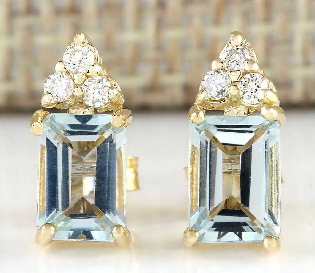 Yellow Gold Diamond And Aquamarine Stud Earrings at Best Price in Indore   The World Of Titan