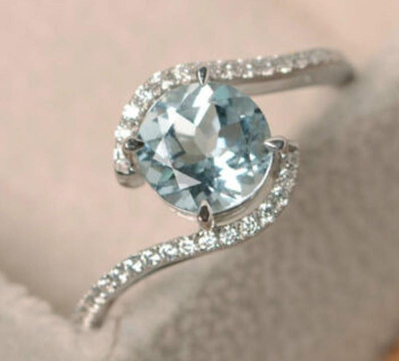 2 CT Round Cut Blue Topaz Diamond 925 Sterling Silver Bypass Halo Ring