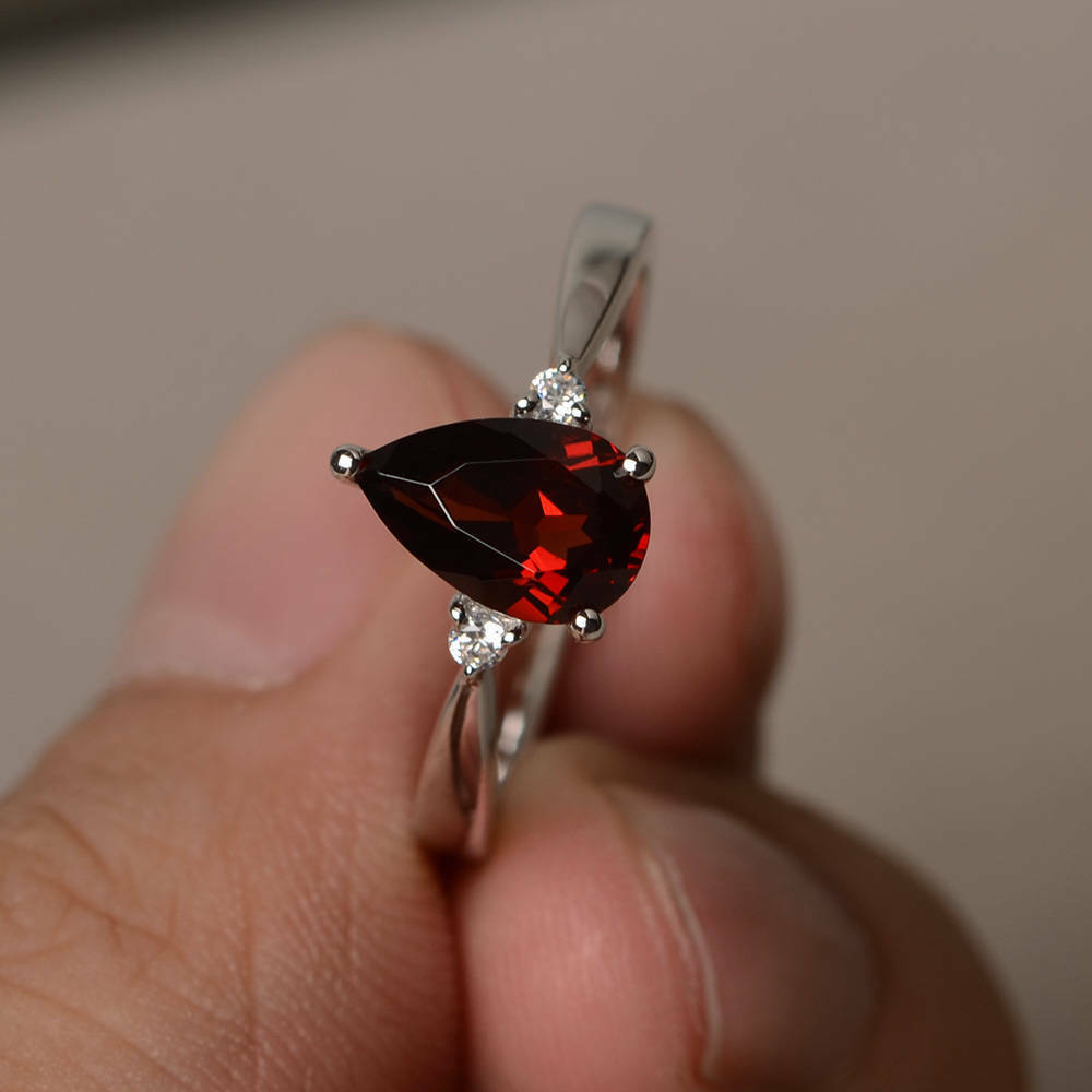 1.20 Ct Pear Cut Red Garnet July Birthstone 925 Sterling Silver Three-Stone Ring
