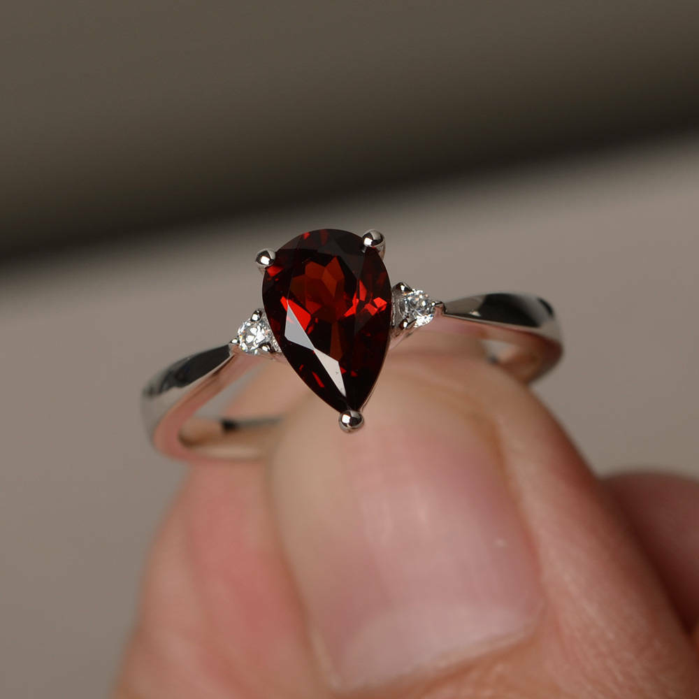 1.20 Ct Pear Cut Red Garnet July Birthstone 925 Sterling Silver Three-Stone Ring