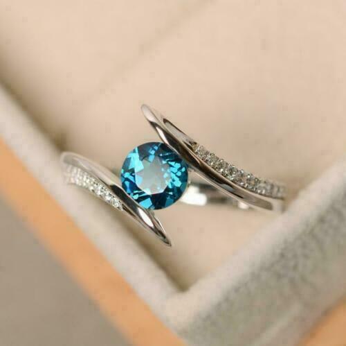 1.10 Ct Round Cut Blue Topaz 925 Sterling Silver Promise Bypass Ring