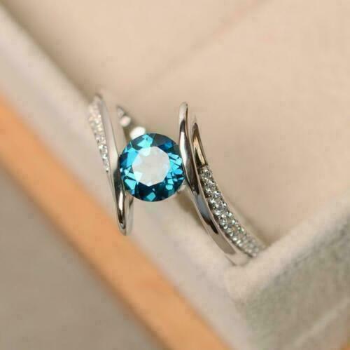 1.10 Ct Round Cut Blue Topaz 925 Sterling Silver Promise Bypass Ring