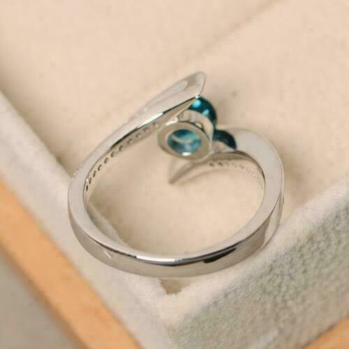 1.10 Ct Round Cut Blue Topaz 925 Sterling Silver Promise Bypass Ring