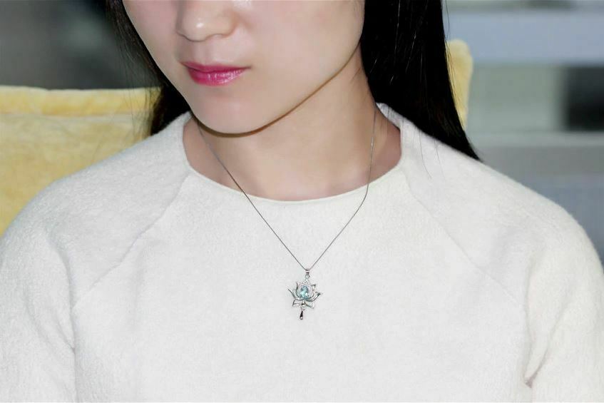 1.20 Ct Pear Cut Aquamarine Elegant Lotus Pendant In 925 Sterling Silver