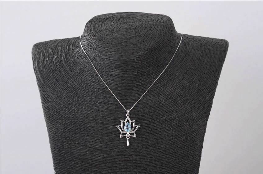 1.20 Ct Pear Cut Aquamarine Elegant Lotus Pendant In 925 Sterling Silver