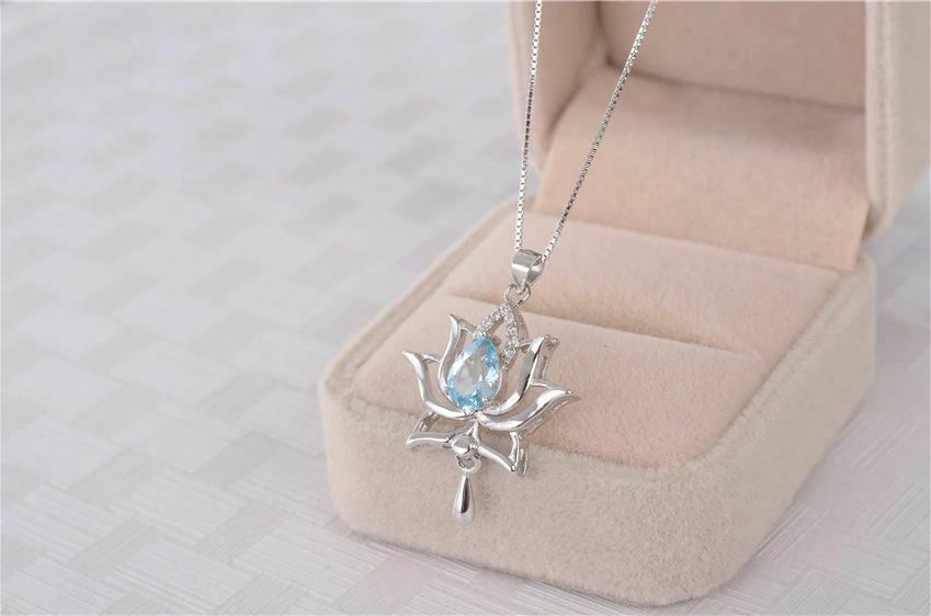 1.20 Ct Pear Cut Aquamarine Elegant Lotus Pendant In 925 Sterling Silver