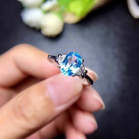 1.25 Ct Oval Cut Blue Topaz Butterfly Engagement Ring 925 Sterling Silver