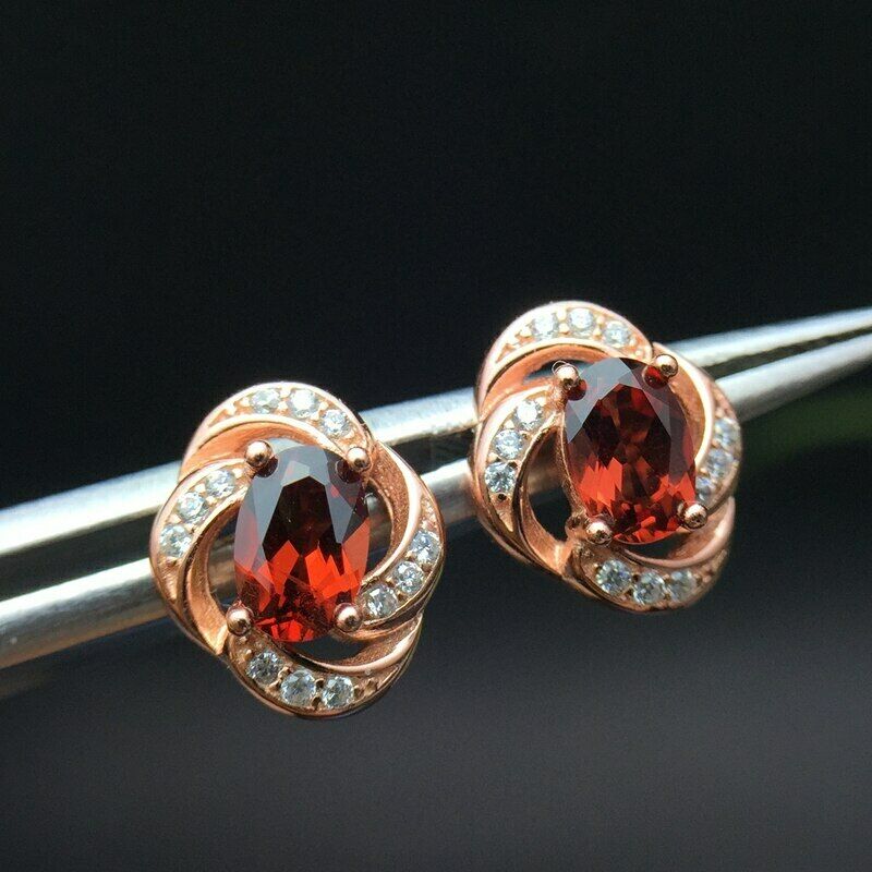 1.20 Ct Oval Cut Red Garnet Rose Gold Plated On 925 Sterling Silver twisted Stud Earring