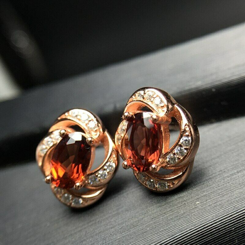 1.20 Ct Oval Cut Red Garnet Rose Gold Plated On 925 Sterling Silver twisted Stud Earring