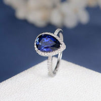 1.50 Ct Pear Cut Blue Sapphire Halo Engagement Ring In 925 Sterling Silver