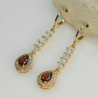 2.50 Ct Pear Cut Red Garnet Drop/Dangle Earrings Yellow Gold Over On 925 Sterling Silver