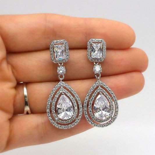 4.50 Ct Pear Cut VVS1/D Double Halo Tear Drop Wedding Earrings In 925 Sterling Silver