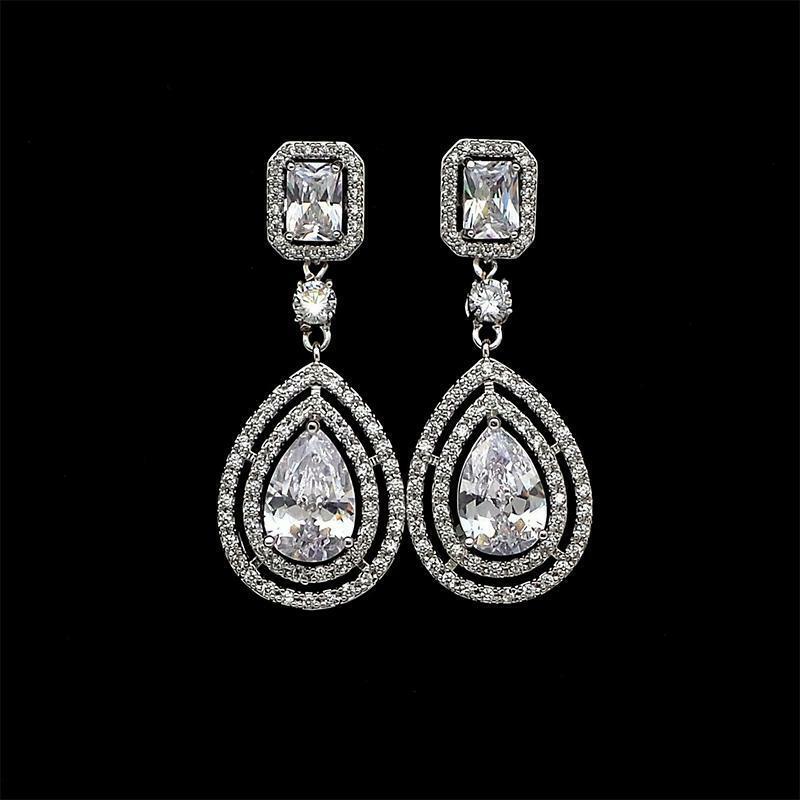 4.50 Ct Pear Cut VVS1/D Double Halo Tear Drop Wedding Earrings In 925 Sterling Silver