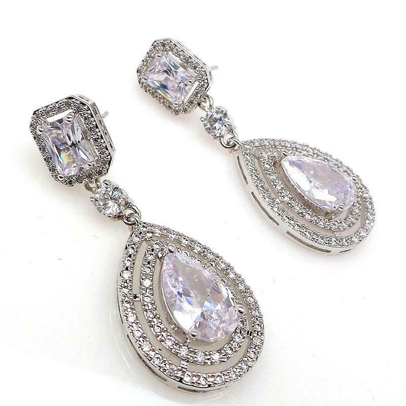 4.50 Ct Pear Cut VVS1/D Double Halo Tear Drop Wedding Earrings In 925 Sterling Silver