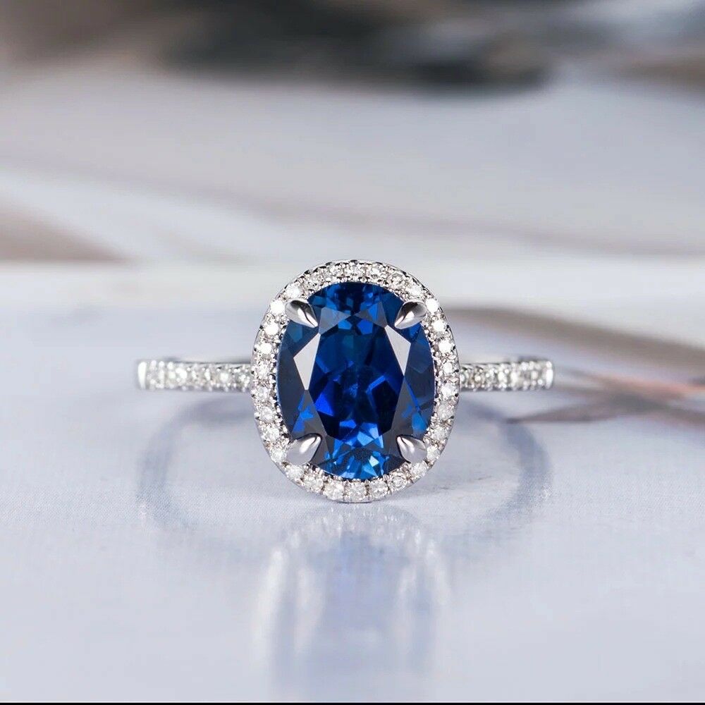 1.50 Ct Oval Cut Blue Sapphire 925 Sterling Silver Halo Engagement Ring
