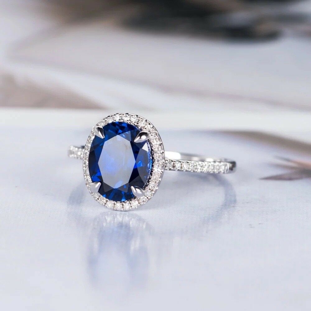 1.50 Ct Oval Cut Blue Sapphire 925 Sterling Silver Halo Engagement Ring