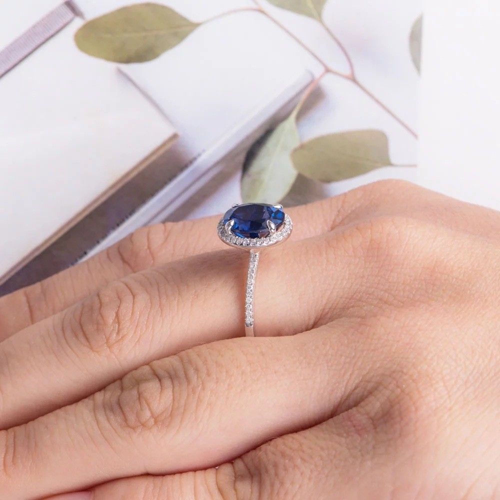 1.50 Ct Oval Cut Blue Sapphire 925 Sterling Silver Halo Engagement Ring