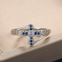 0.50 Ct Round Cut Blue Sapphire & White Diamond 925 Sterling Silver Cross Ring