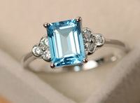 2 CT Emerald Cut Blue Topaz Diamond 925 Sterling Silver Unisex Engagement Ring