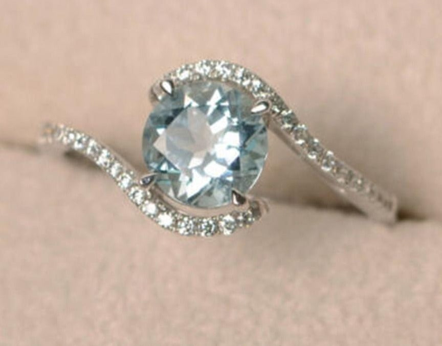 2 CT Round Cut Blue Topaz Diamond 925 Sterling Silver Bypass Halo Ring