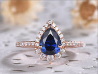 2.30 Ct Pear Cut Blue Sapphire Rose Gold Over On 925 Sterling Silver Halo Engagement Ring