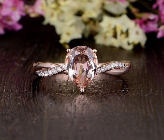 2.50 Ct Pear Cut Morganite & White CZ Infinity Engagement Ring In 925 Sterling Silver
