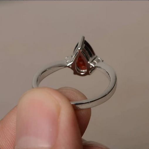 1.20 Ct Pear Cut Red Garnet Three-Stone Promise Ring In 925 Sterling Silver