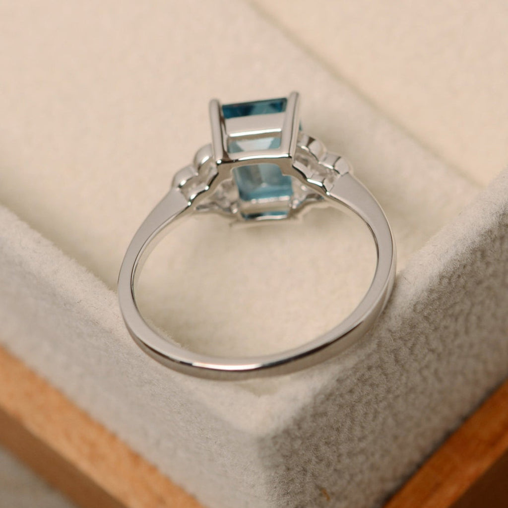 1 CT Emerald Cut London Blue Topaz White Gold Over On 925 Sterling Silver Solitaire W/Accents Ring