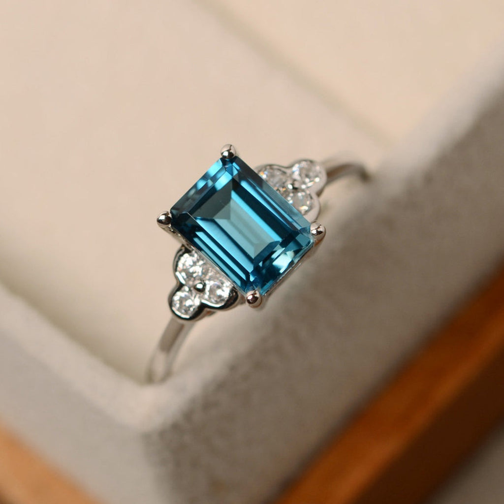 1 CT Emerald Cut London Blue Topaz White Gold Over On 925 Sterling Silver Solitaire W/Accents Ring