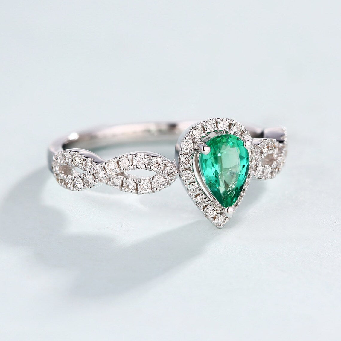 1 CT Pear Cut Emerald & CZ Diamond White Gold Over On 925 Sterling Silver Twisted Infinity Engagement Ring