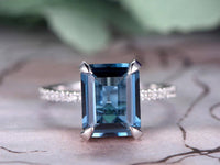 1 CT Emerald Cut London Blue Topaz White Gold Over On 925 Sterling Silver Under Halo Engagement Ring