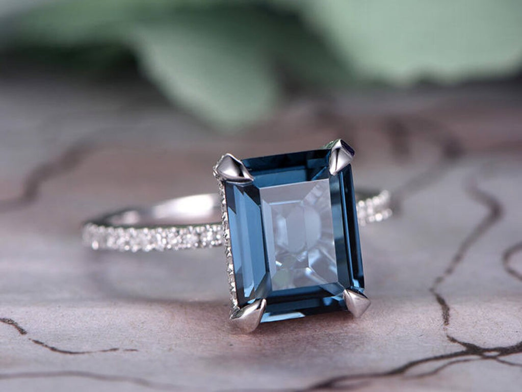 1 CT Emerald Cut London Blue Topaz White Gold Over On 925 Sterling Silver Under Halo Engagement Ring