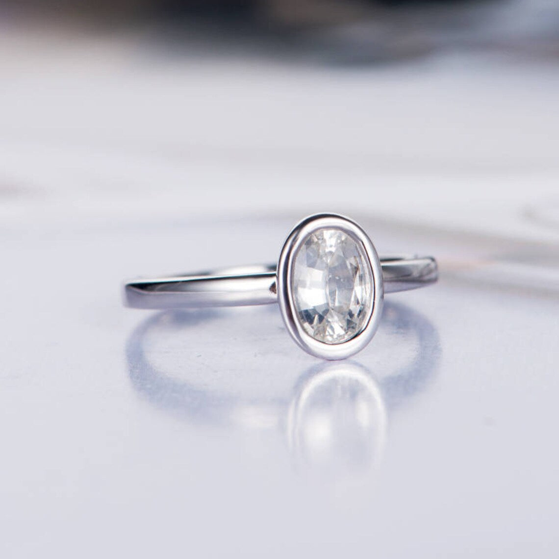 1.25 Ct Oval Cut White Topaz 925 Sterling Silver Bezel Set Solitaire Ring