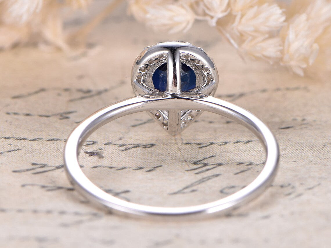 1.50 Ct Pear Cut Blue Sapphire 925 Sterling Silver Halo Anniversary Ring For Her