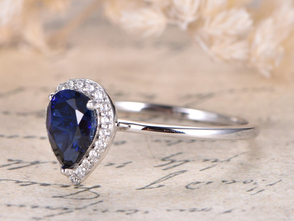 1.50 Ct Pear Cut Blue Sapphire 925 Sterling Silver Halo Anniversary Ring For Her