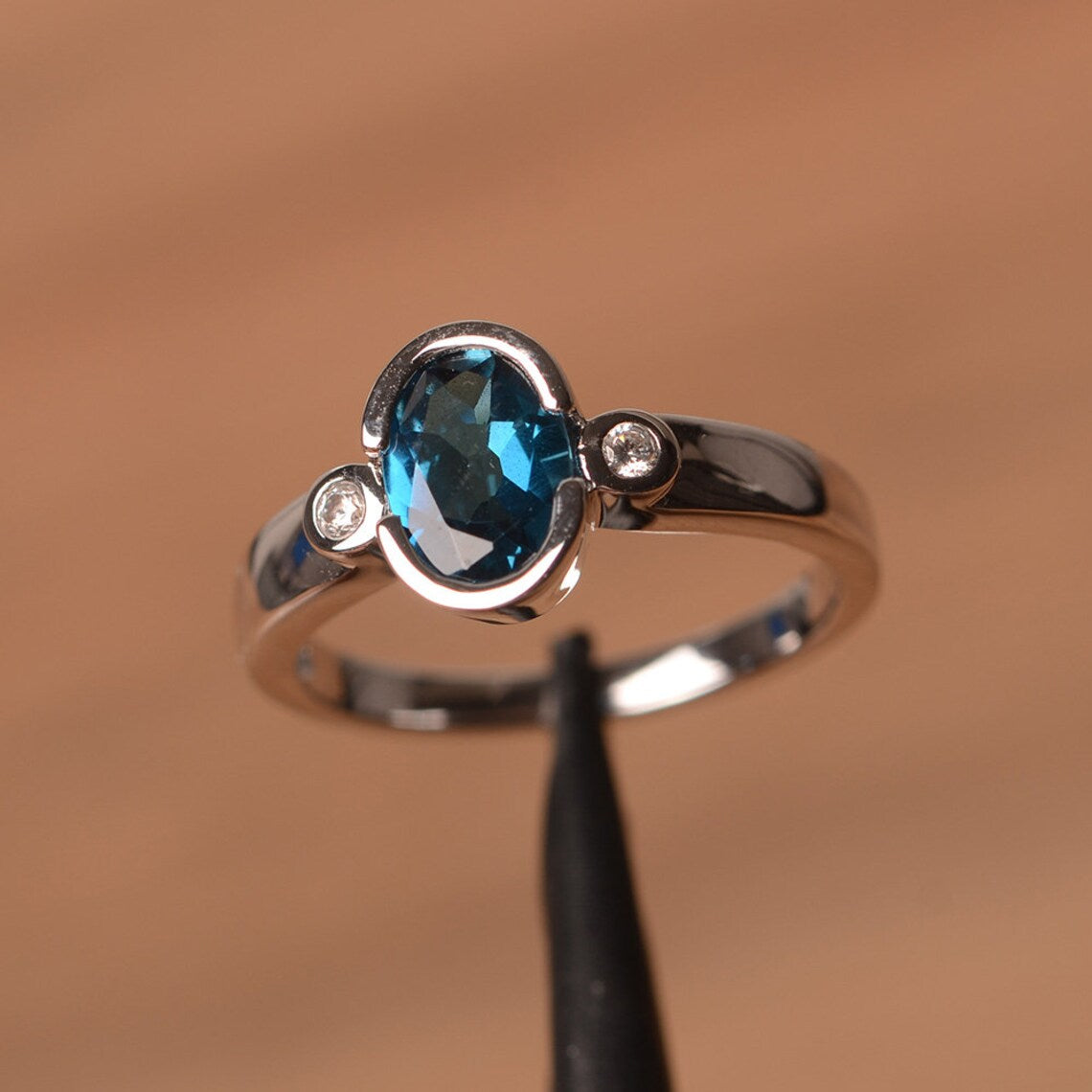 1.50 Ct Oval Cut London Blue Topaz Bezel Set Three Stone Promise Ring In 925 Sterling Silver