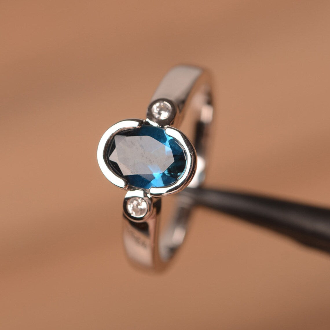 1.50 Ct Oval Cut London Blue Topaz Bezel Set Three Stone Promise Ring In 925 Sterling Silver