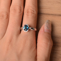 1.50 Ct Oval Cut London Blue Topaz Bezel Set Three Stone Promise Ring In 925 Sterling Silver
