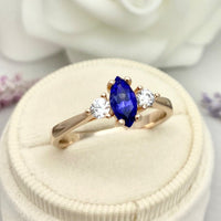 1 CT Marquise Cut Tanzanite Rose Gold Over On 925 Sterling Silver Three Stone Ring