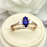 1 CT Marquise Cut Tanzanite Rose Gold Over On 925 Sterling Silver Three Stone Ring